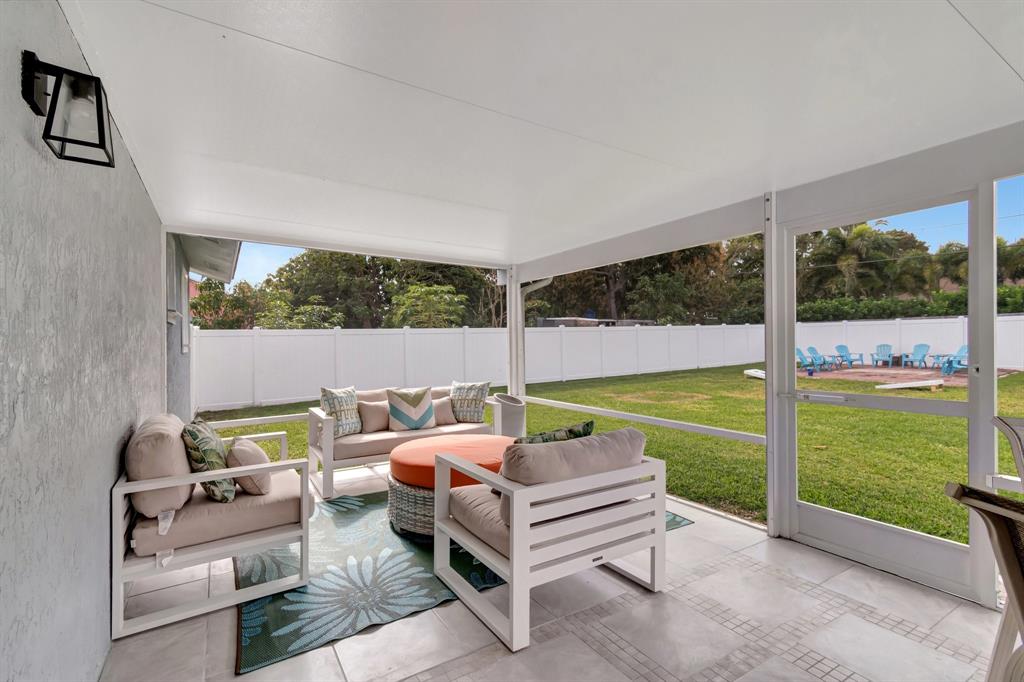 710 Southeast 3rd Avenue Delray Beach, FL 33483 - Photo 23 of 31 a outdoor sitting area with furniture and garden