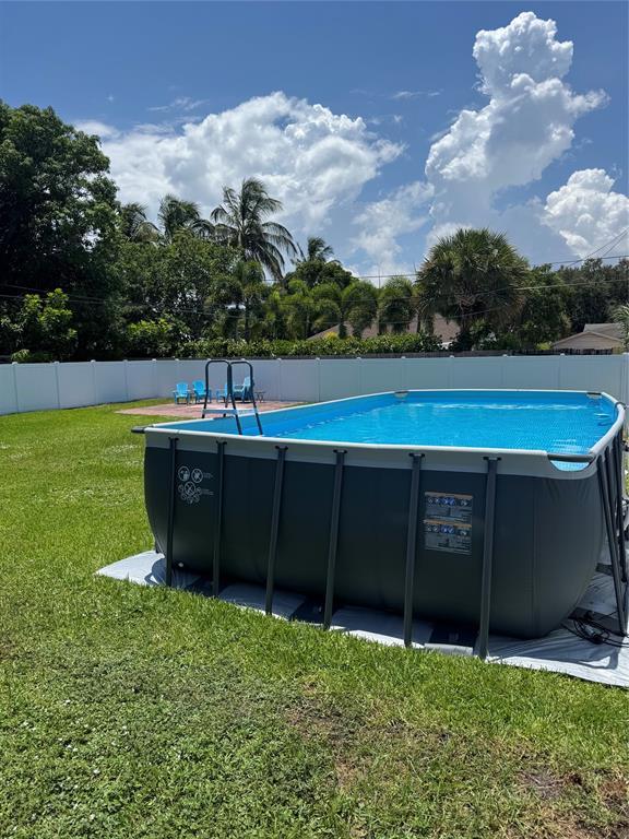 710 Southeast 3rd Avenue Delray Beach, FL 33483 - Photo 30 of 31 a view of an outdoor space and a yard