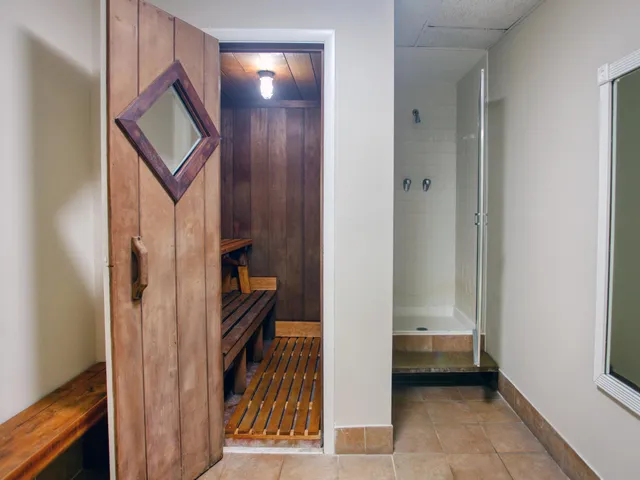 a view of a room with furniture and window