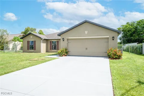a view of outdoor space yard and garage