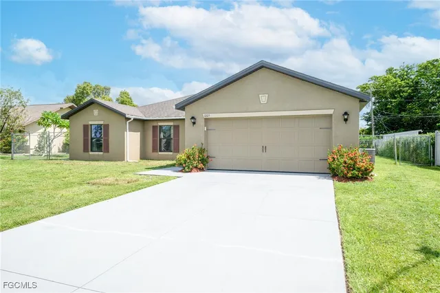a view of outdoor space yard and garage