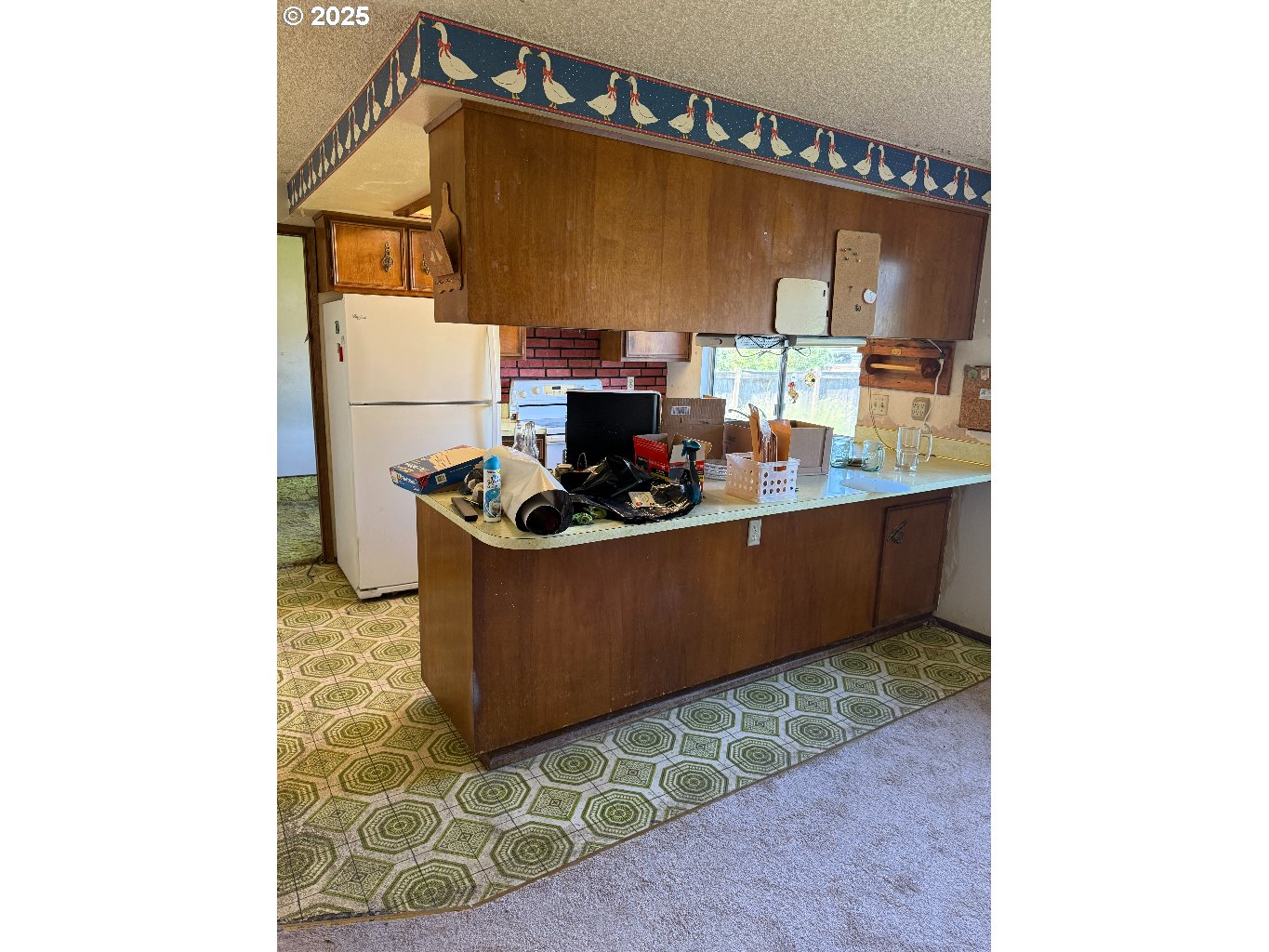 587 71st Street Springfield, OR 97478 - Photo 3 of 19 a room with a table and a chair