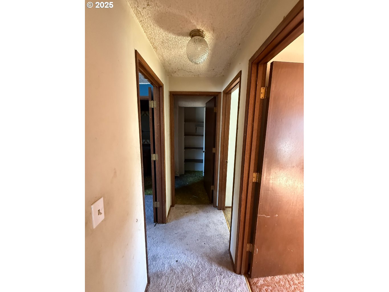587 71st Street Springfield, OR 97478 - Photo 9 of 19 a view of a hallway with wooden floor