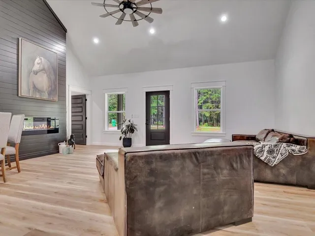 a living room with furniture and window