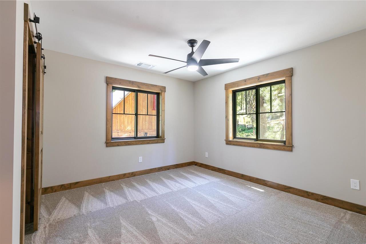 15611 Conifer Drive Truckee, CA 96161 - Photo 11 of 20 a view of an empty room with a window