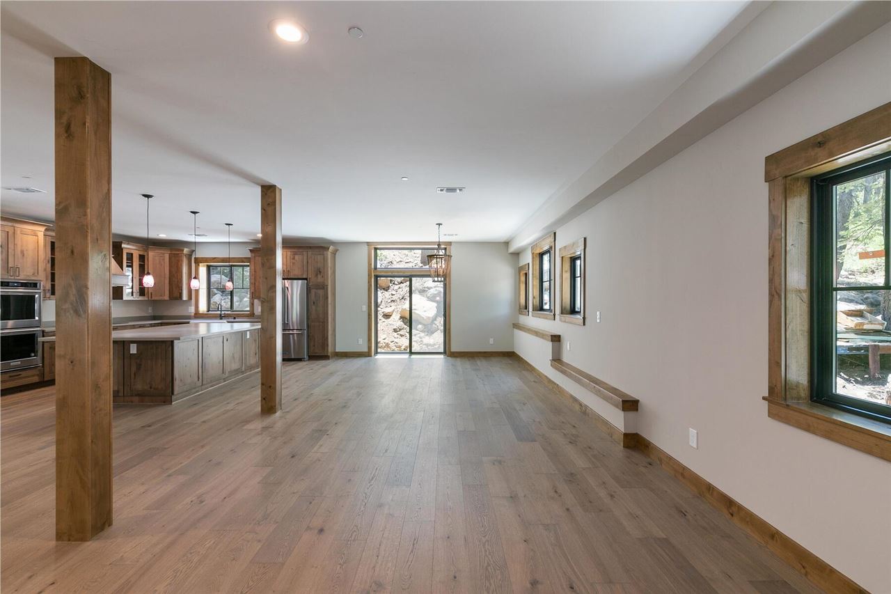 15611 Conifer Drive Truckee, CA 96161 - Photo 13 of 20 a view of a living room hardwood floor and a kitchen