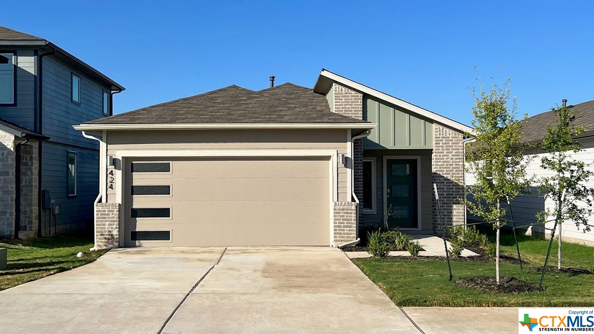 424 Wilshire Road San Marcos, TX 78666 - Photo 1 of 1 a front view of a house with a yard