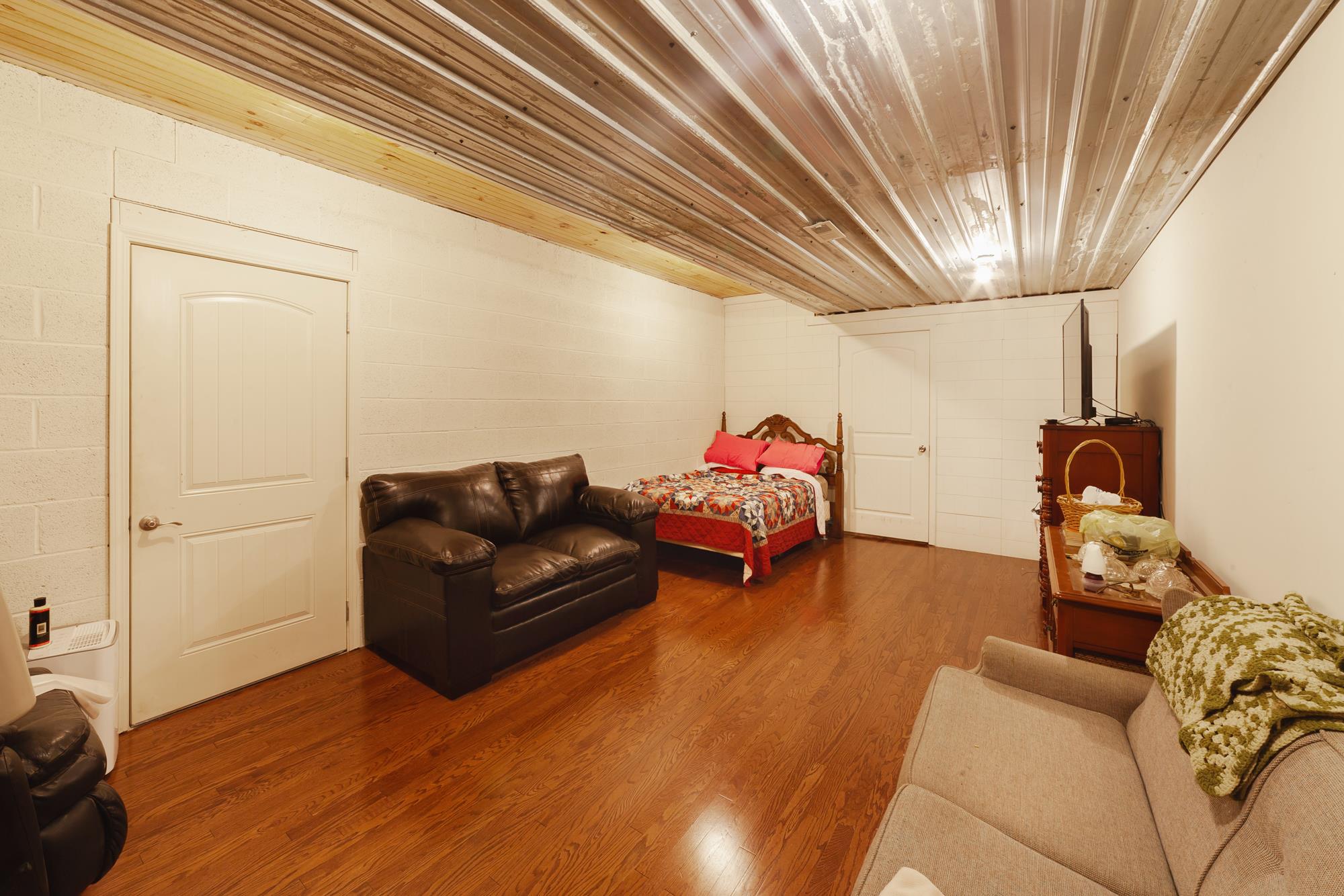 7338 Michael Lankford Road Fairview, TN 37062 - Photo 4 of 17 Finished basement space with safe room or possible storm shelter.