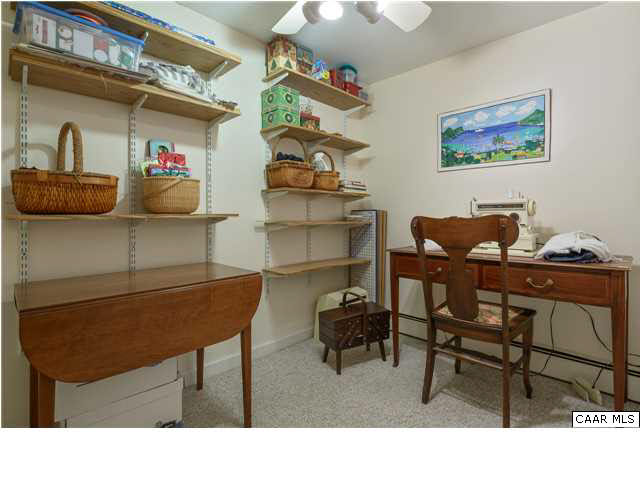 4284 Slam Gate Road Crozet, VA 22932 - Photo 15 of 30 a living room with furniture and a chair