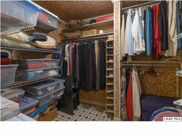 4284 Slam Gate Road Crozet, VA 22932 - Photo 16 of 30 a view of walk in closet with clothes