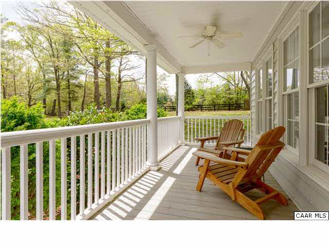 4284 Slam Gate Road Crozet, VA 22932 - Photo 20 of 30 a view of a two chairs in the balcony