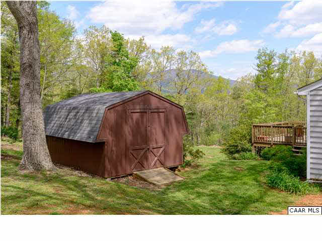 4284 Slam Gate Road Crozet, VA 22932 - Photo 21 of 30 a view of a backyard with barn and a cactus plant