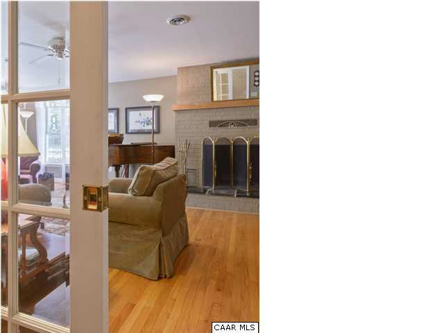 4284 Slam Gate Road Crozet, VA 22932 - Photo 3 of 30 a living room with furniture and a fireplace