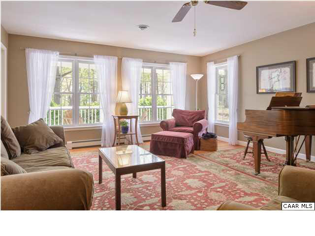 4284 Slam Gate Road Crozet, VA 22932 - Photo 4 of 30 a living room with furniture a table and a large window