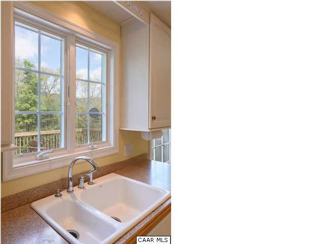 4284 Slam Gate Road Crozet, VA 22932 - Photo 7 of 30 a bathroom with a sink and a window