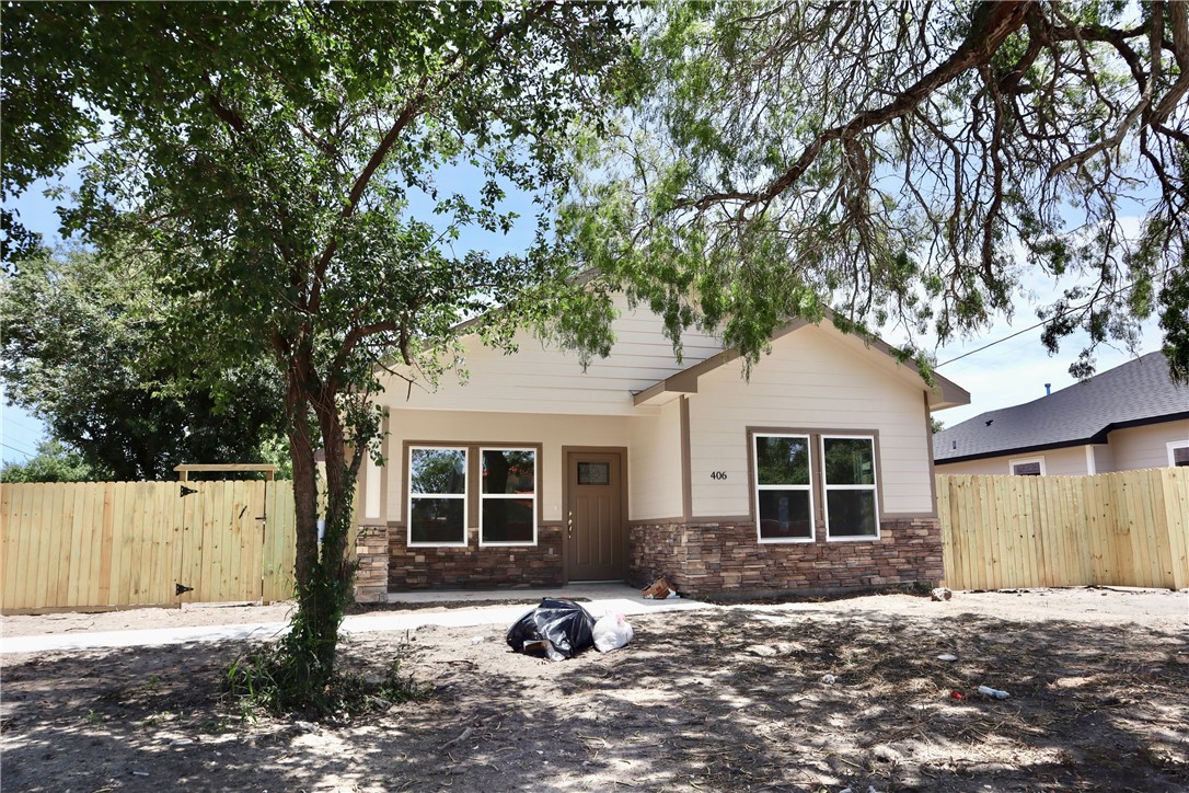 406 Old Robstown Road Corpus Christi, TX 78408 - Photo 15 of 15 a front view of a house with a yard
