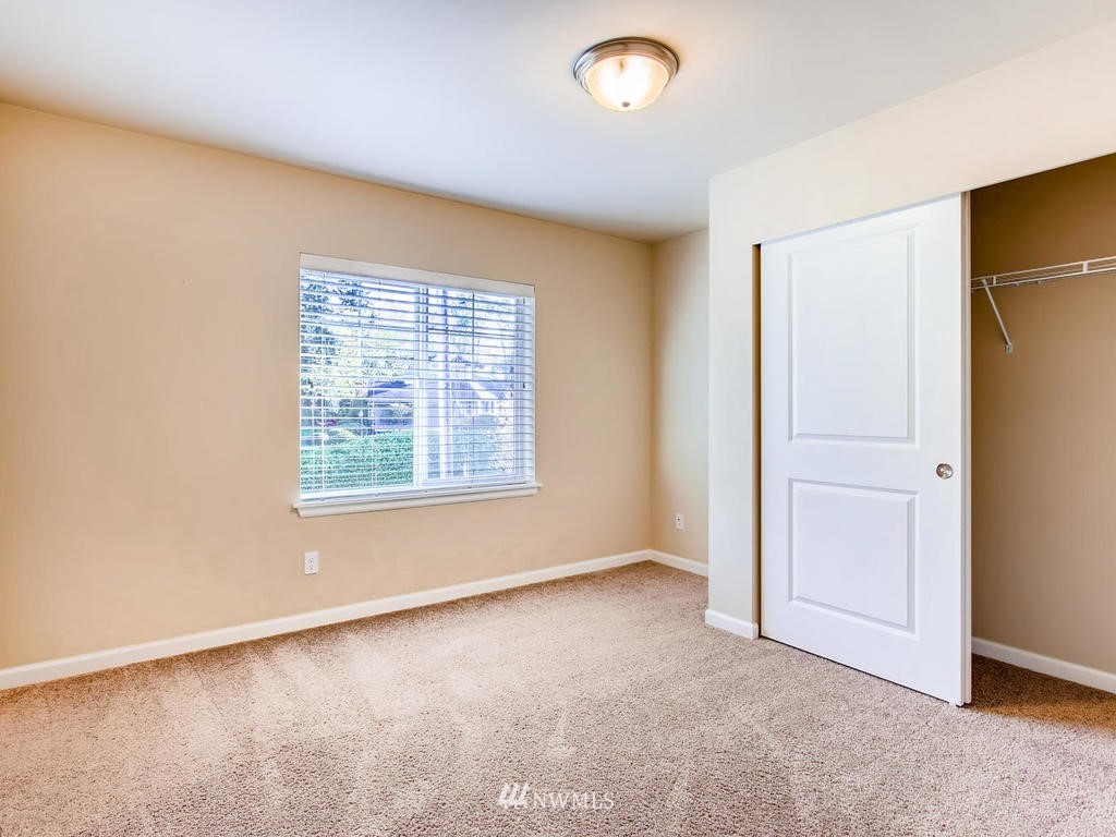 418 South 37th Street Renton, WA 98055 - Photo 21 of 24 an empty room with a empty space and windows
