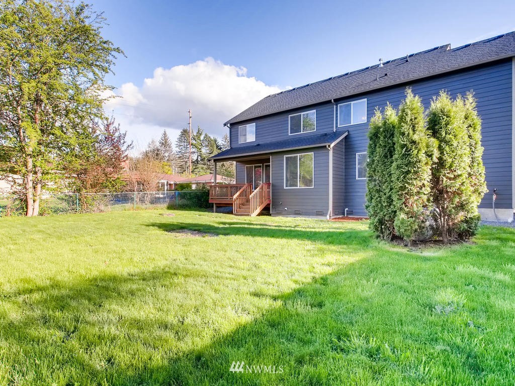 418 South 37th Street Renton, WA 98055 - Photo 24 of 24 a front view of a house with garden