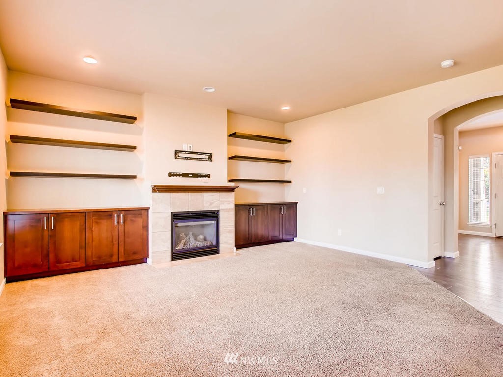 418 South 37th Street Renton, WA 98055 - Photo 7 of 24 a view of a livingroom with a fireplace