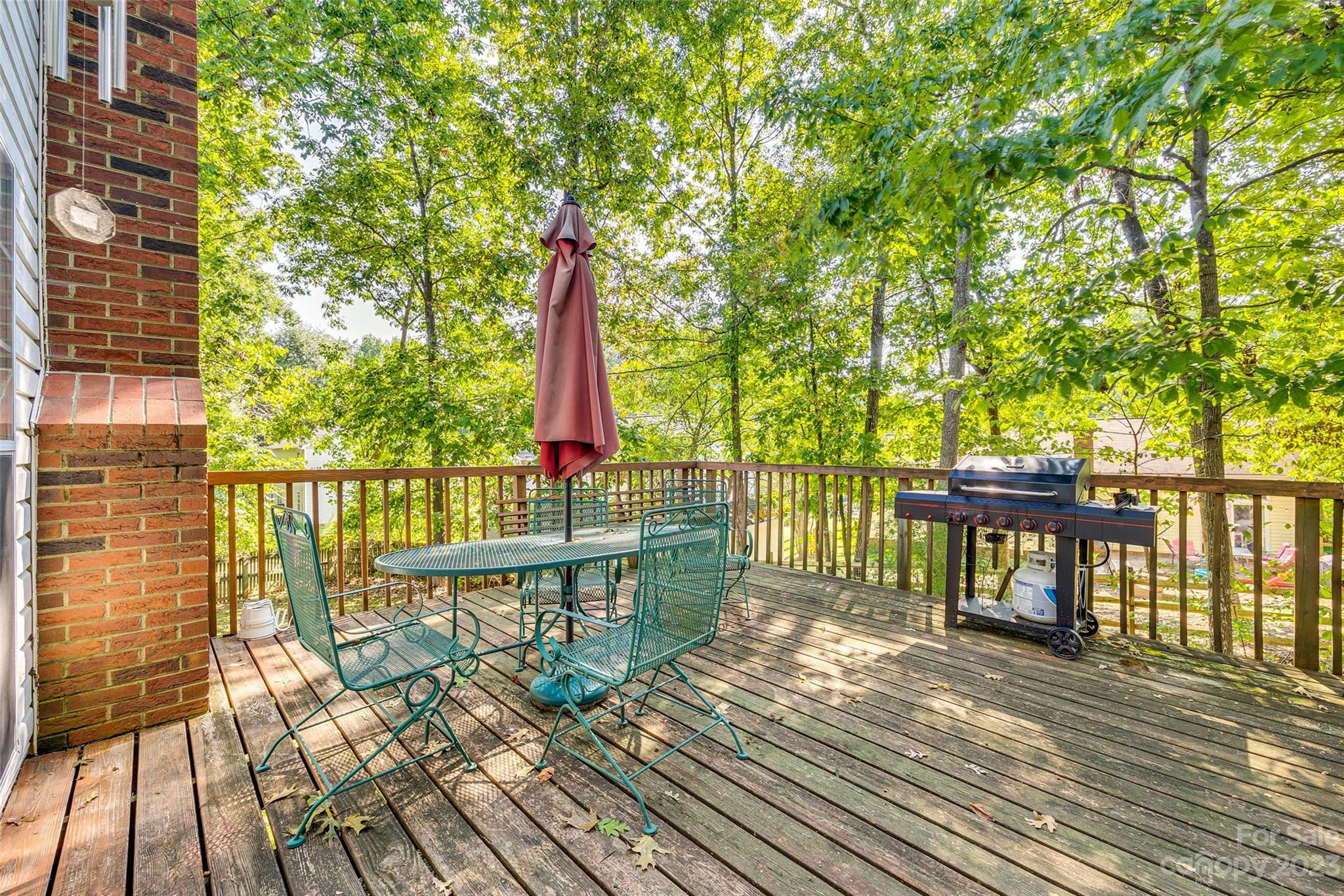 10305 Hatter Ridge Terrace Charlotte, NC 28214 - Photo 29 of 36 a view of a balcony with wooden floor and iron stairs