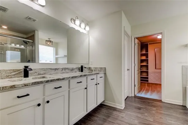 an empty room with a view of a bathroom