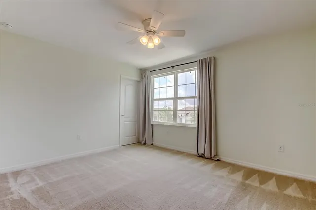 a view of a yard in front of a house