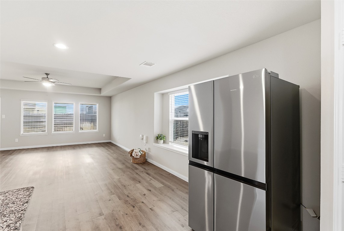 995 Rice Drive Bryan, TX 77803 - Photo 11 of 23 a kitchen with stainless steel appliances granite countertop a refrigerator and a sink