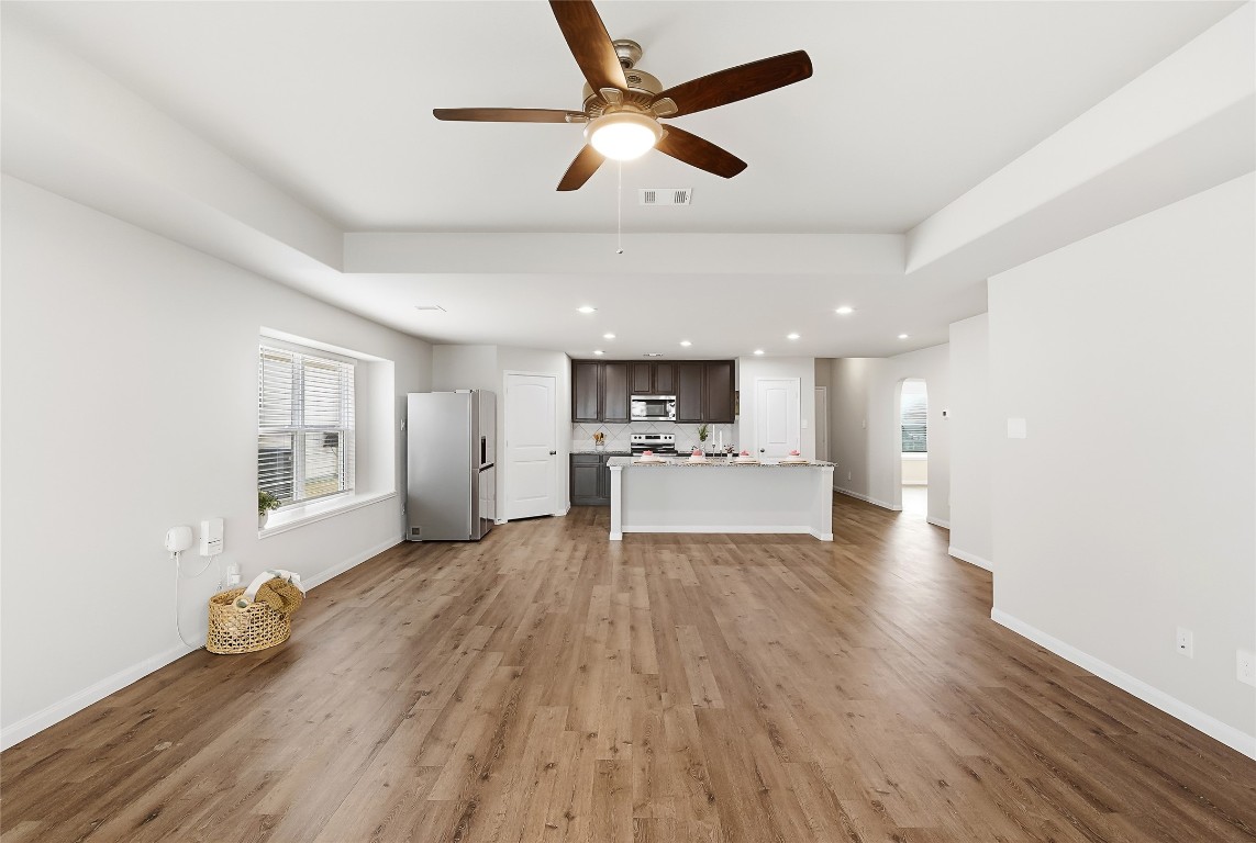 995 Rice Drive Bryan, TX 77803 - Photo 15 of 23 a view of kitchen with refrigerator microwave and stove