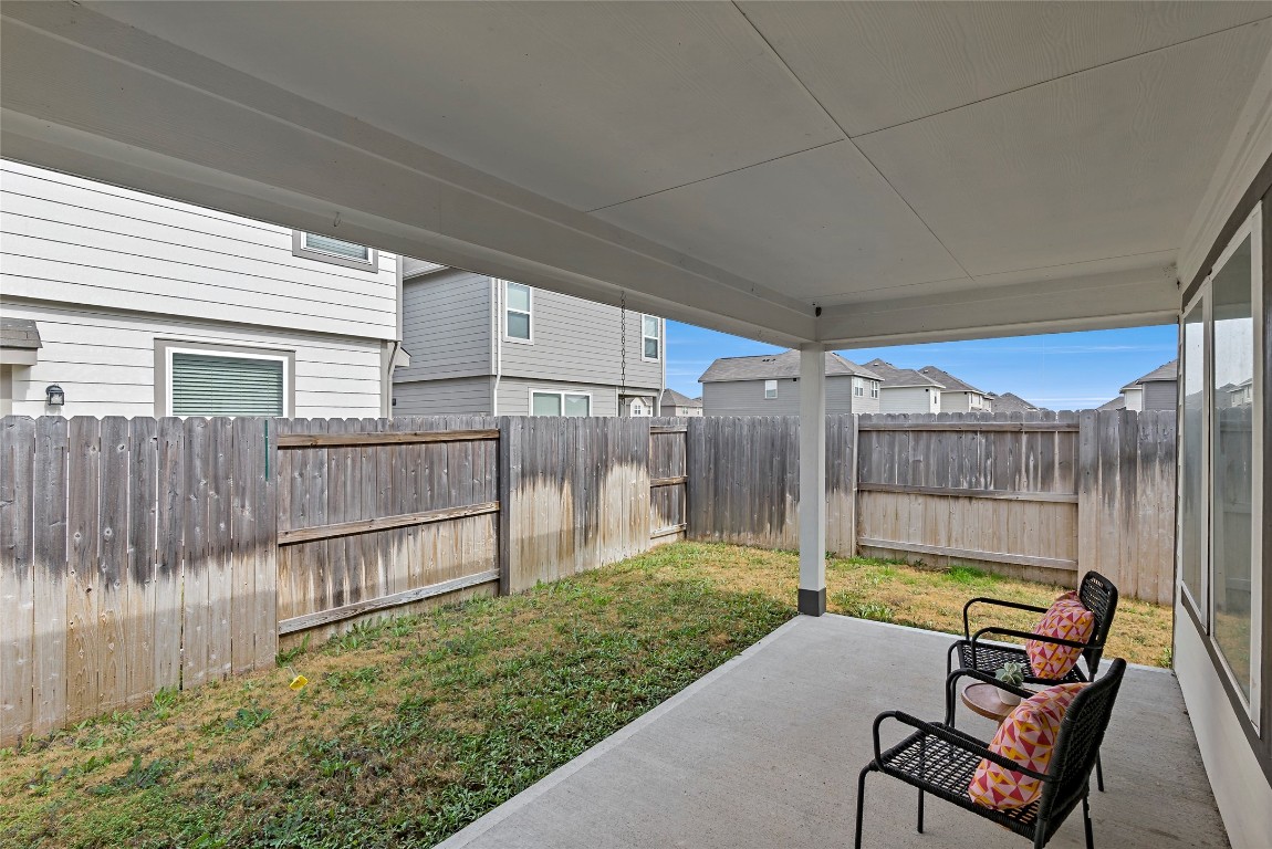 995 Rice Drive Bryan, TX 77803 - Photo 20 of 23 a backyard of a house with table and chairs