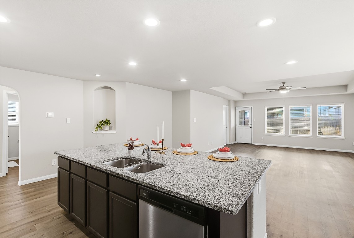 995 Rice Drive Bryan, TX 77803 - Photo 10 of 23 a bathroom with a granite countertop sink and a large mirror