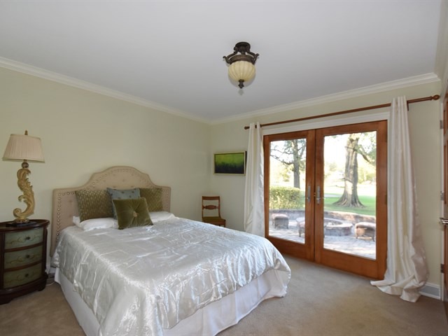 575 Aberdeen Road Frankfort, IL 60423 - Photo 20 of 25 a bedroom with a large bed and a large window
