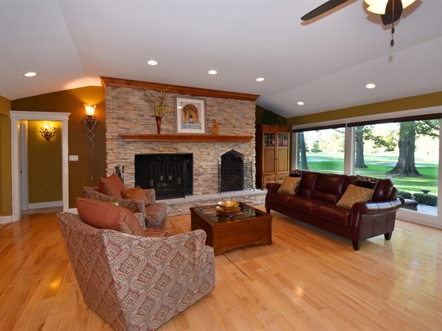 575 Aberdeen Road Frankfort, IL 60423 - Photo 4 of 25 a living room with furniture and a fireplace