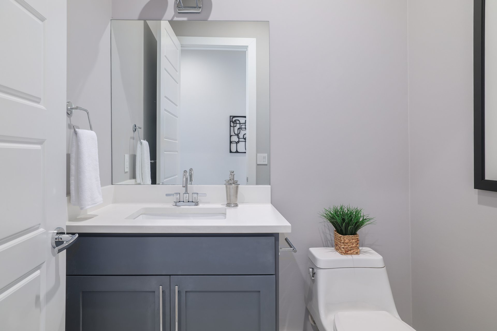 1103 Saucedo Street, Unit 2 Austin, TX 78721 - Photo 12 of 26 Half bath on the main floor