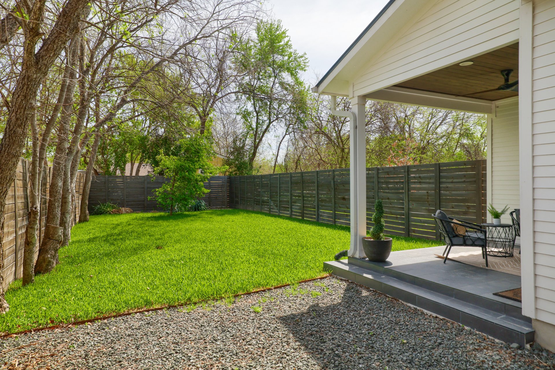 1103 Saucedo Street, Unit 2 Austin, TX 78721 - Photo 23 of 26 This transition from the living room to the outdoors creates an inviting space for hosting friends