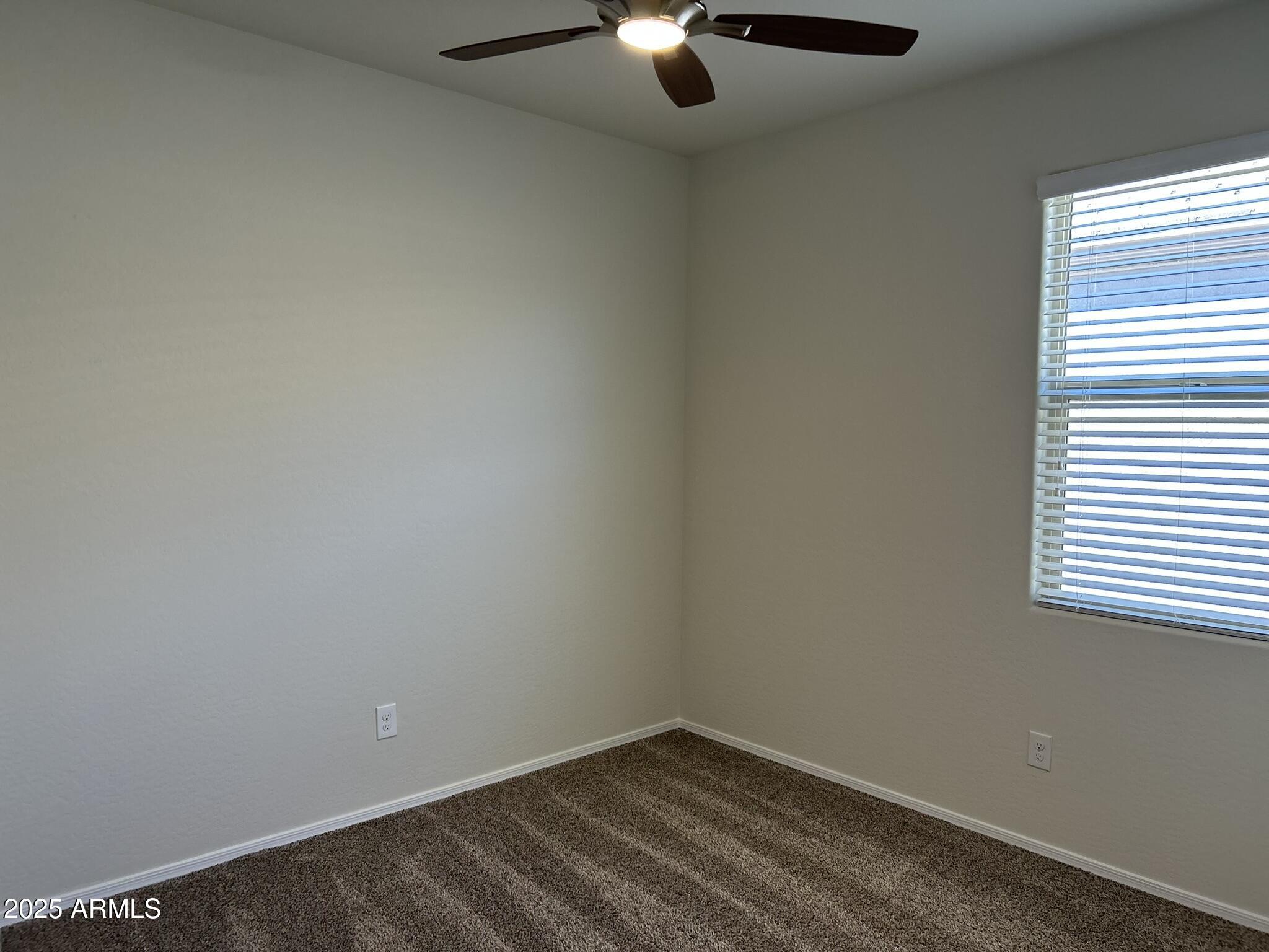 4734 East Pearl Road San Tan Valley, AZ 85143 - Photo 13 of 27 an empty room with a window