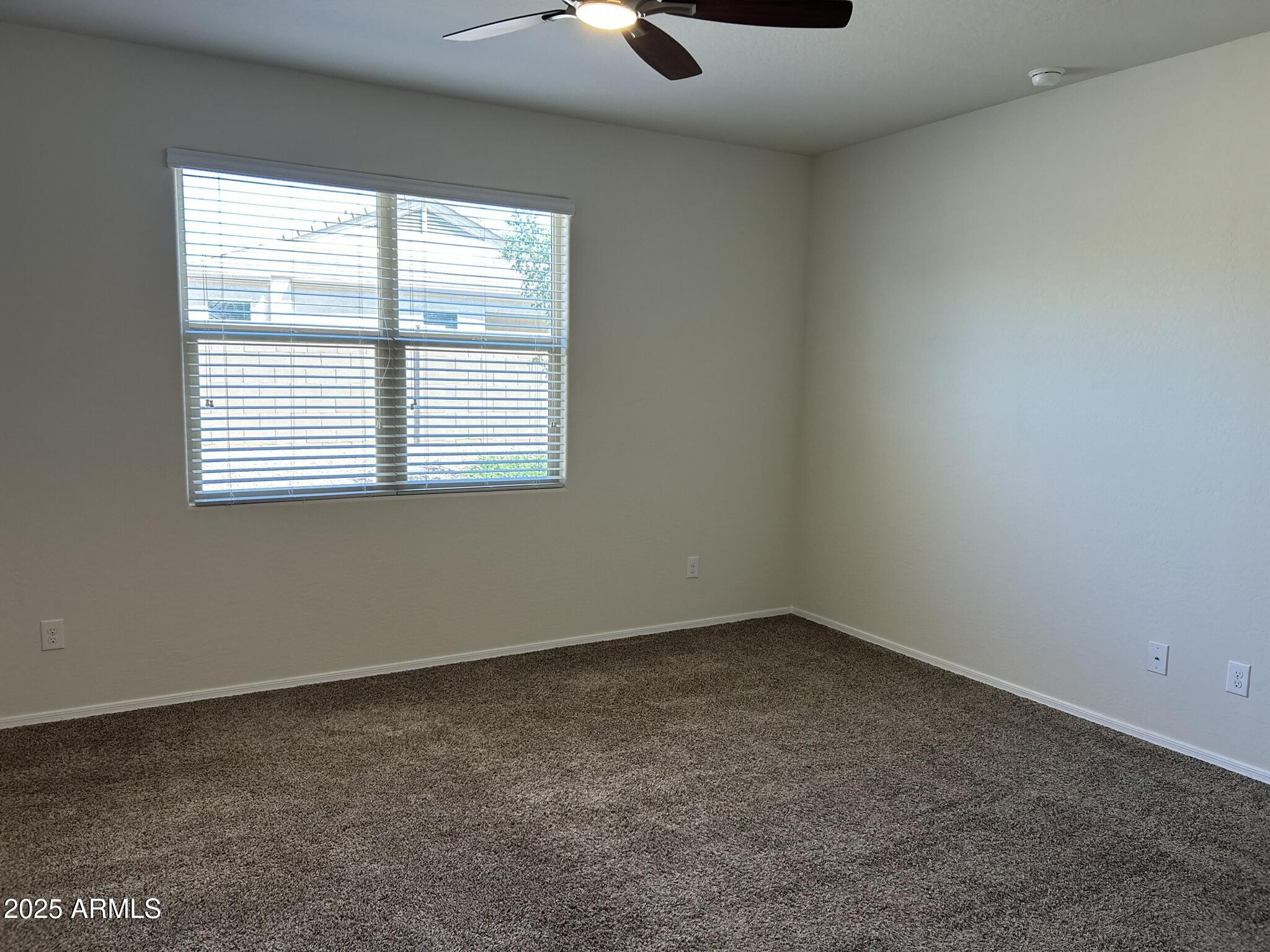 4734 East Pearl Road San Tan Valley, AZ 85143 - Photo 15 of 27 an empty room with a window