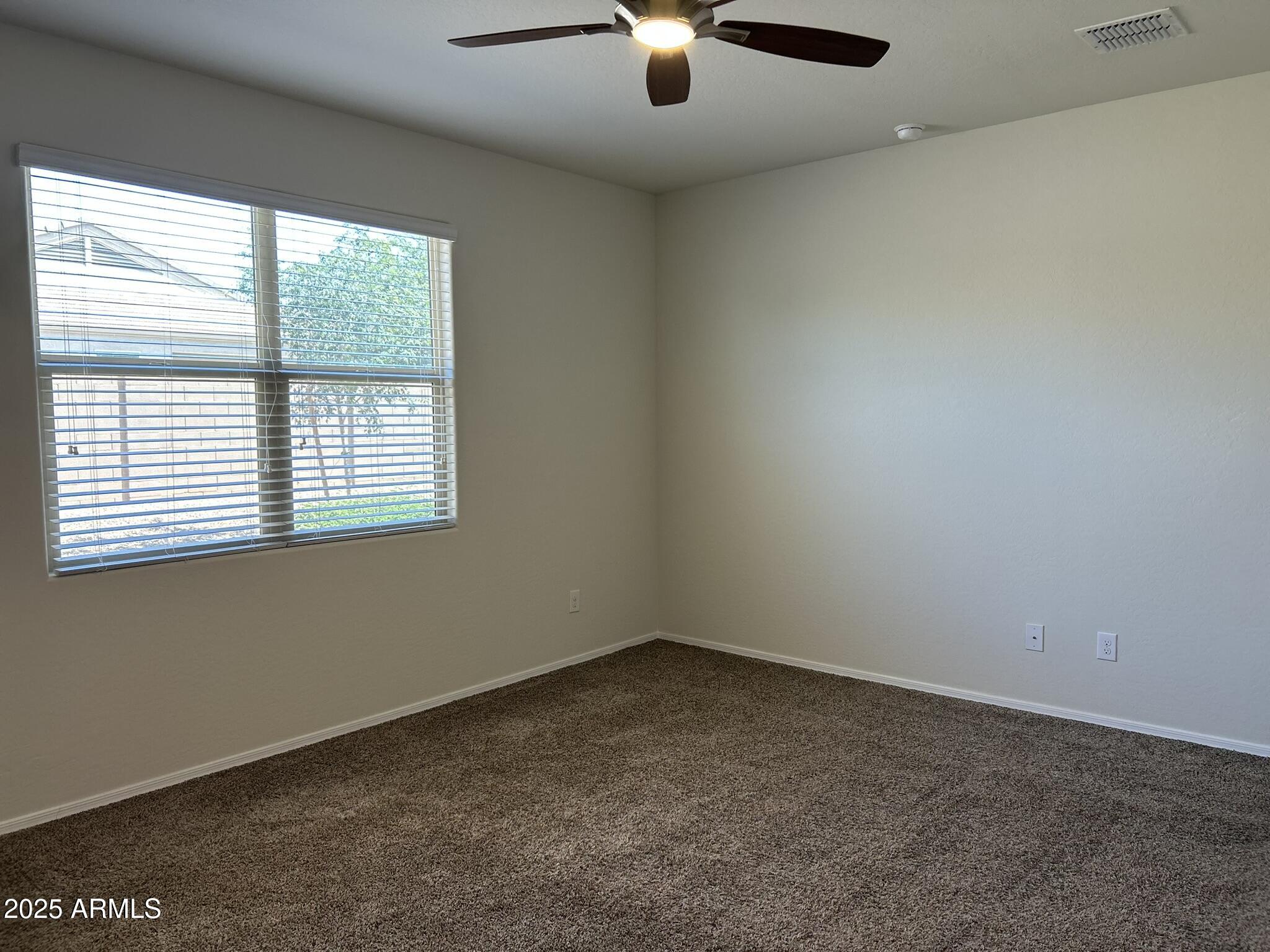 4734 East Pearl Road San Tan Valley, AZ 85143 - Photo 16 of 27 an empty room with a window