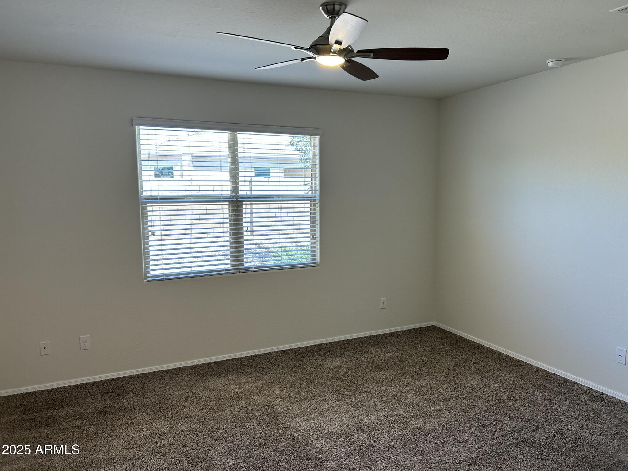 4734 East Pearl Road San Tan Valley, AZ 85143 - Photo 17 of 27 an empty room with a window