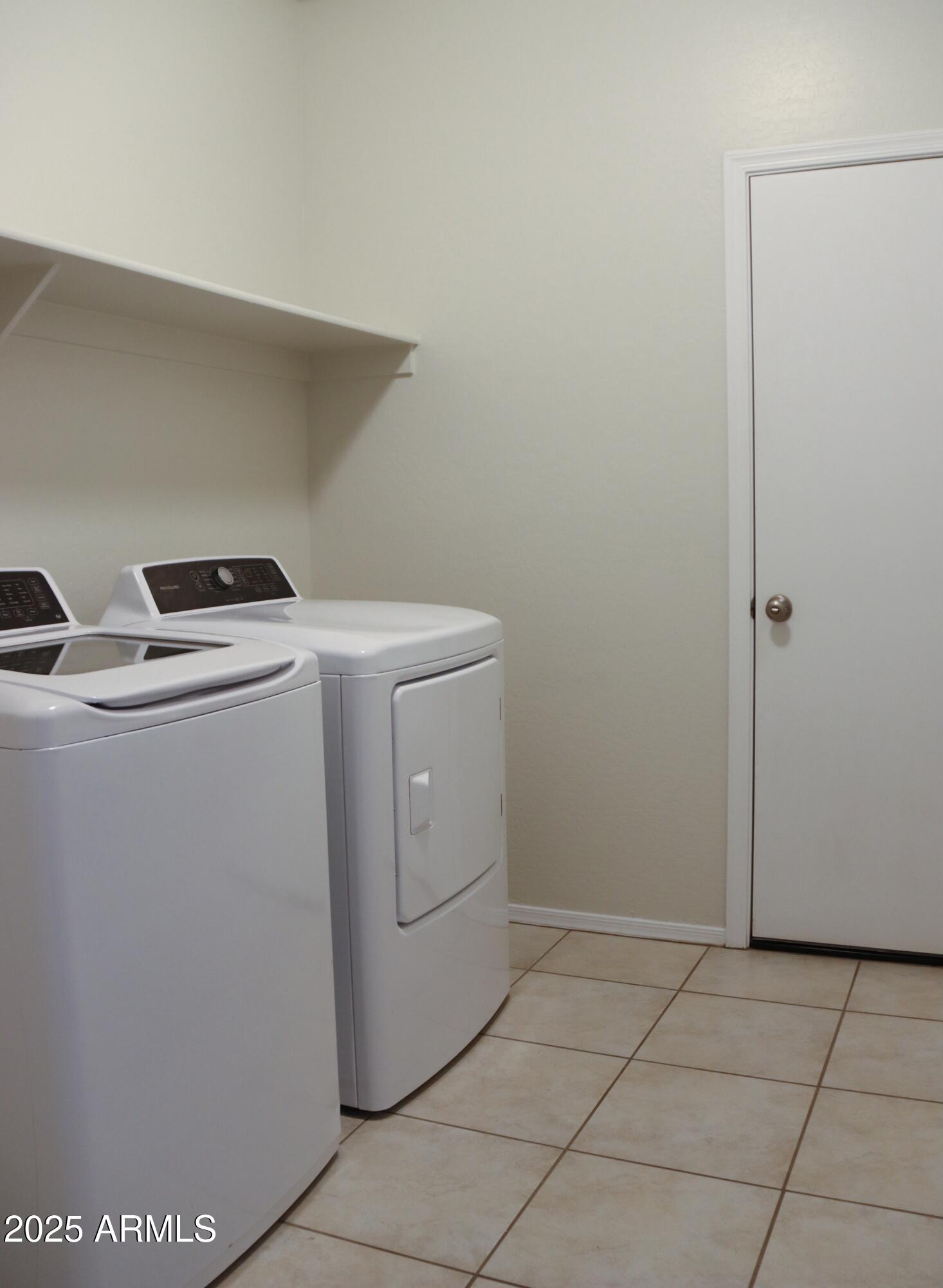 4734 East Pearl Road San Tan Valley, AZ 85143 - Photo 26 of 27 a utility room with dryer and washer