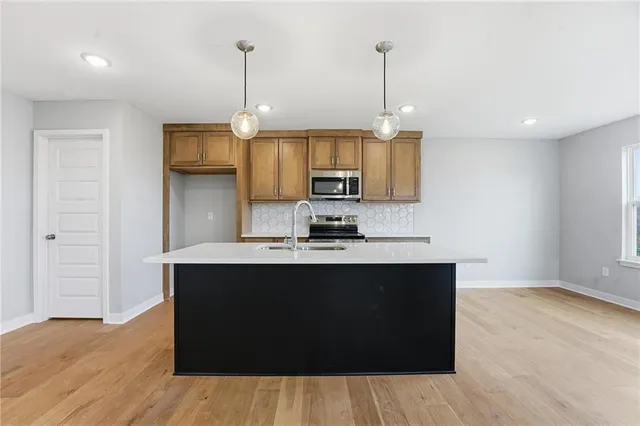 $425,000 | 706 Glenn Circle, Raymore, MO 64083