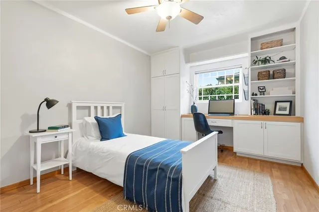 a bed room with a bed and a window