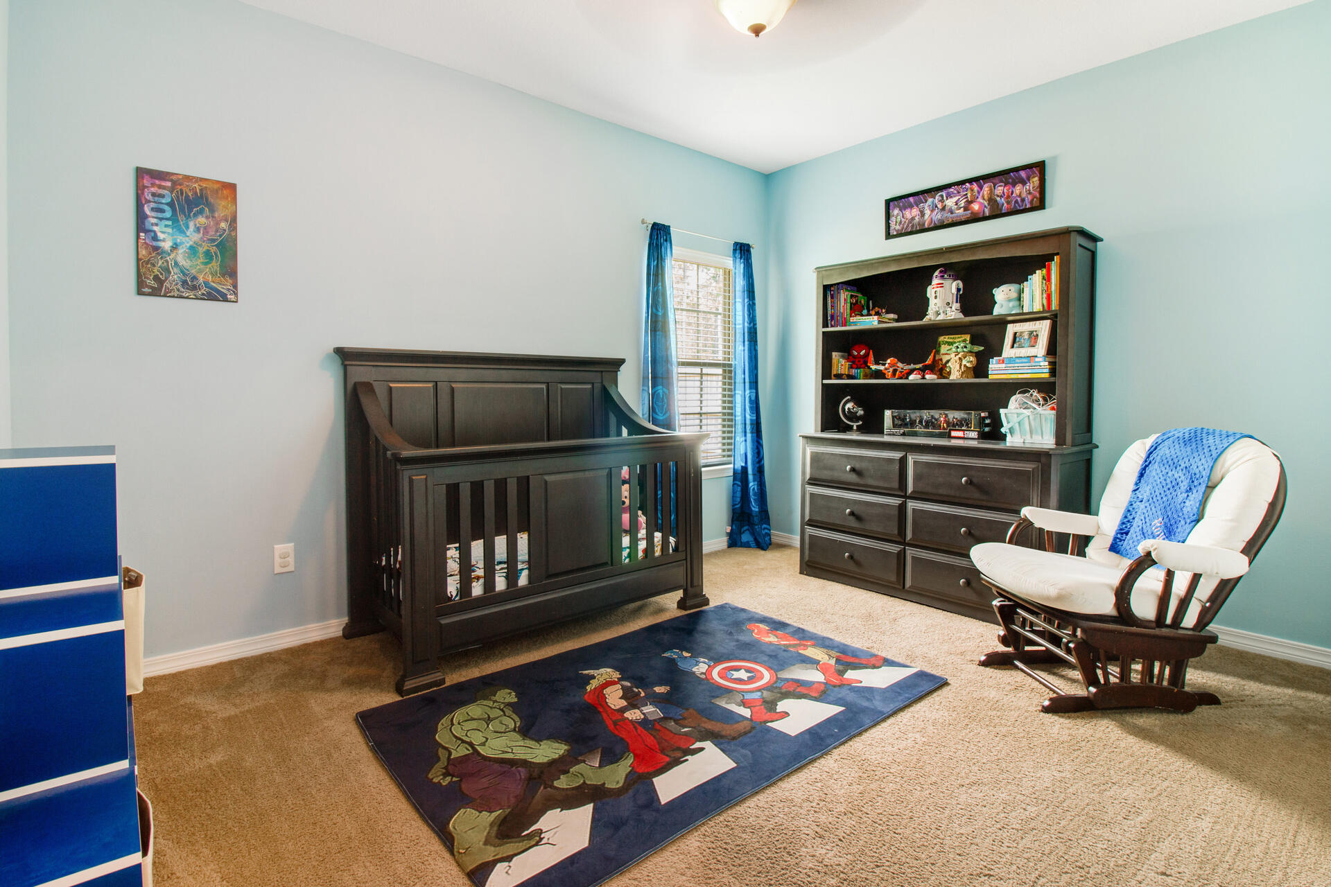 6212 Timberland Ridge Drive Crestview, FL 32539 - Photo 22 of 34 a living room with furniture cabinets and a wooden floor