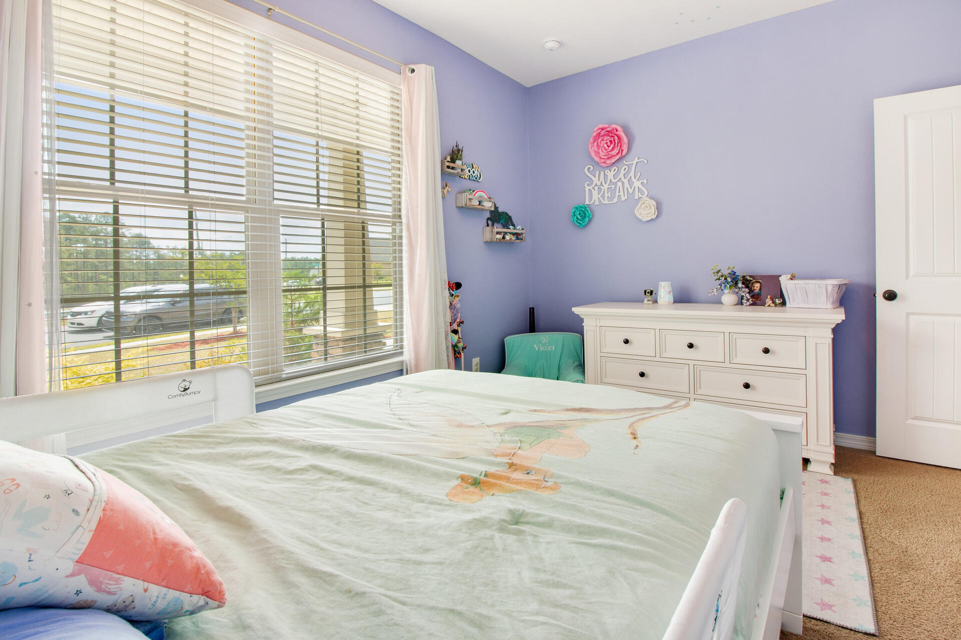 6212 Timberland Ridge Drive Crestview, FL 32539 - Photo 26 of 34 a bedroom with a bed and a large window