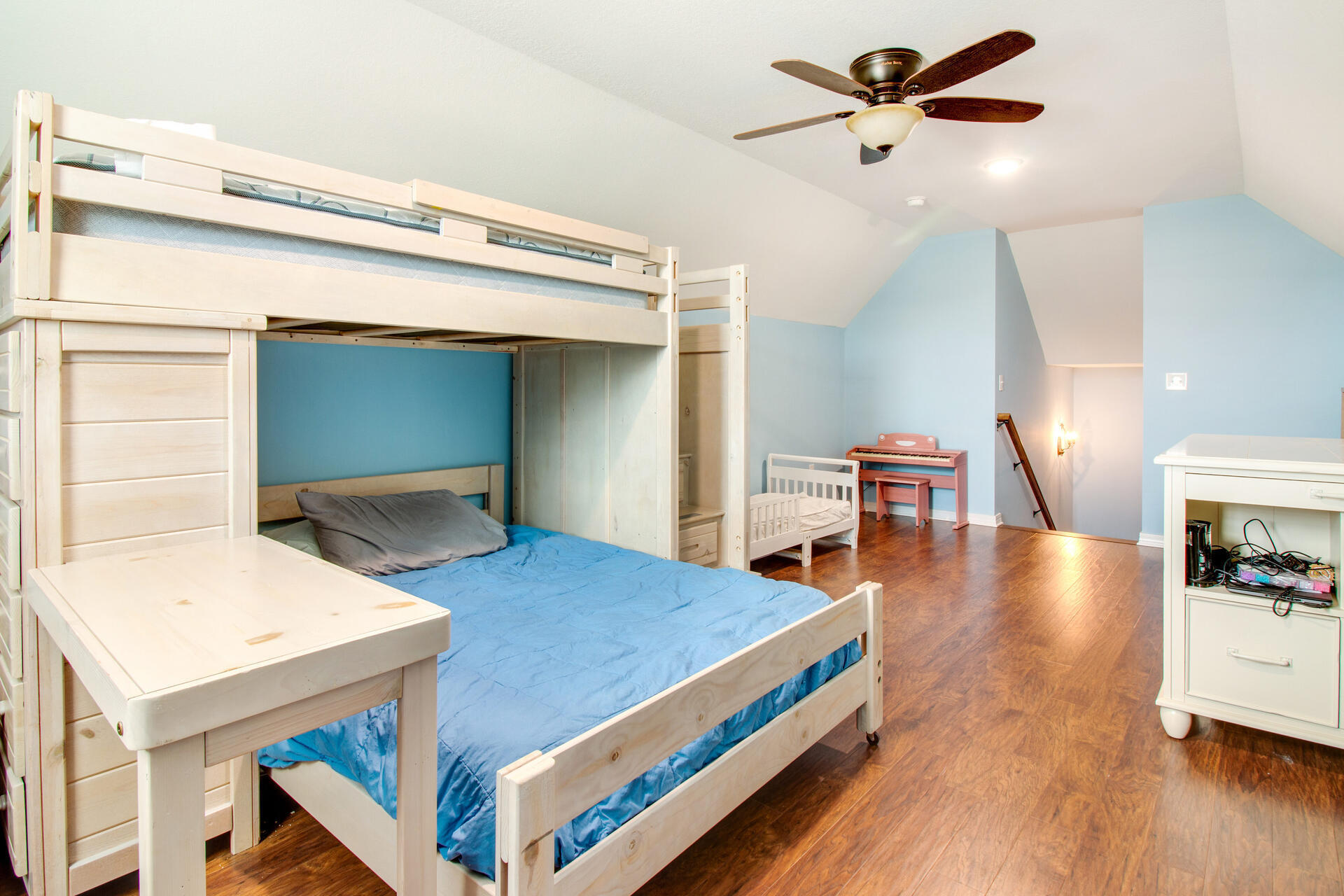 6212 Timberland Ridge Drive Crestview, FL 32539 - Photo 29 of 34 a bedroom with a bed and a chandelier