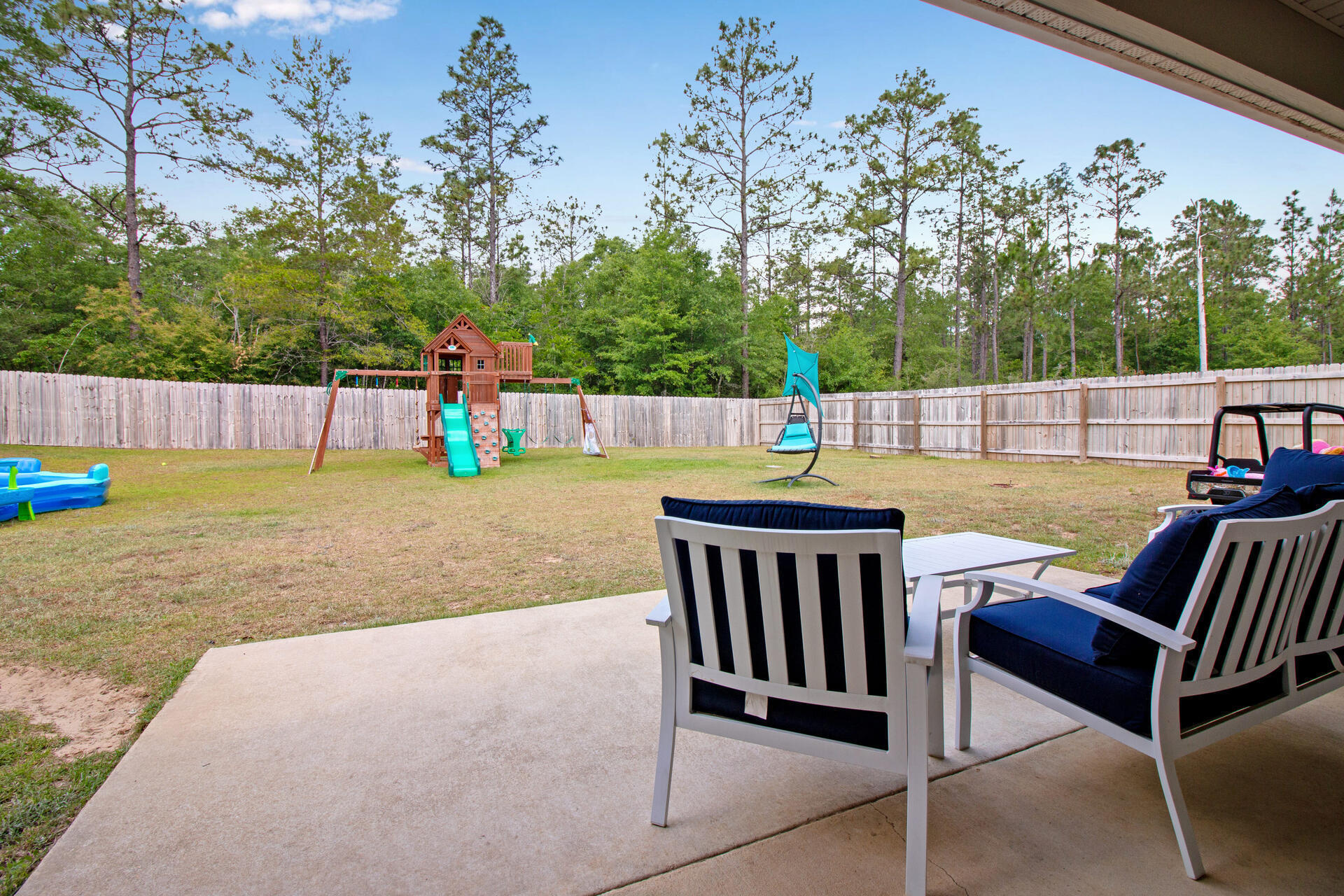 6212 Timberland Ridge Drive Crestview, FL 32539 - Photo 31 of 34 swimming pool view with a seating space