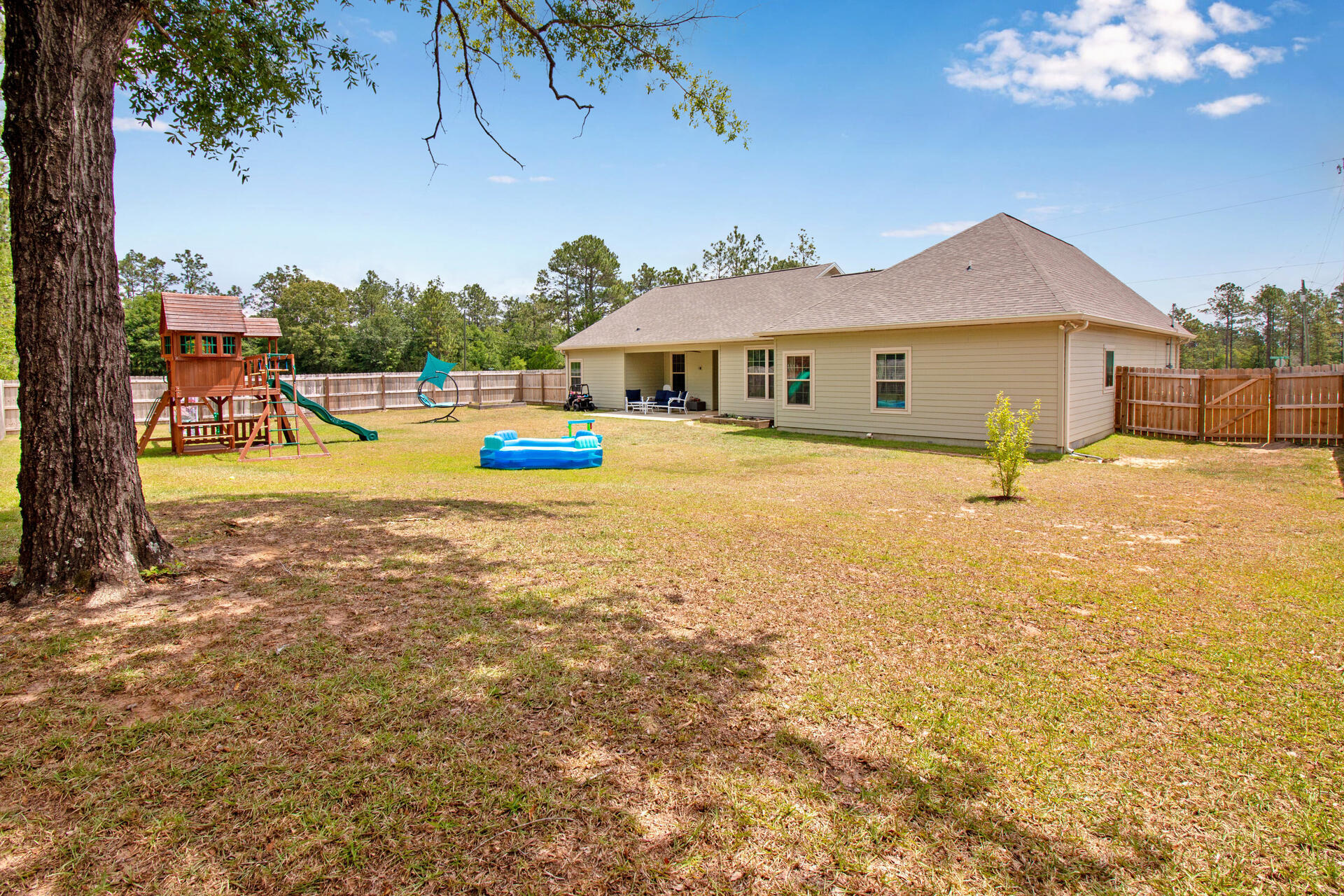 6212 Timberland Ridge Drive Crestview, FL 32539 - Photo 34 of 34 a view of a house with swimming pool
