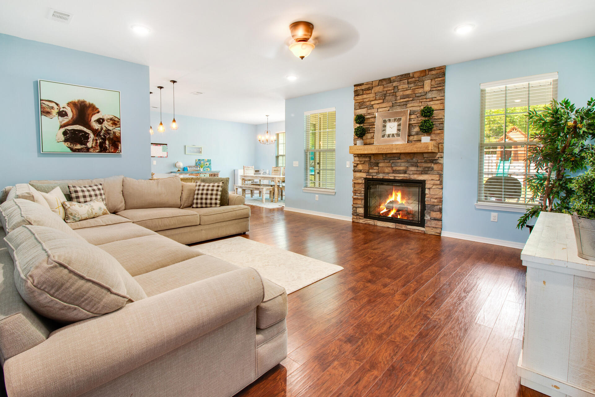6212 Timberland Ridge Drive Crestview, FL 32539 - Photo 6 of 34 a living room with furniture and a fireplace