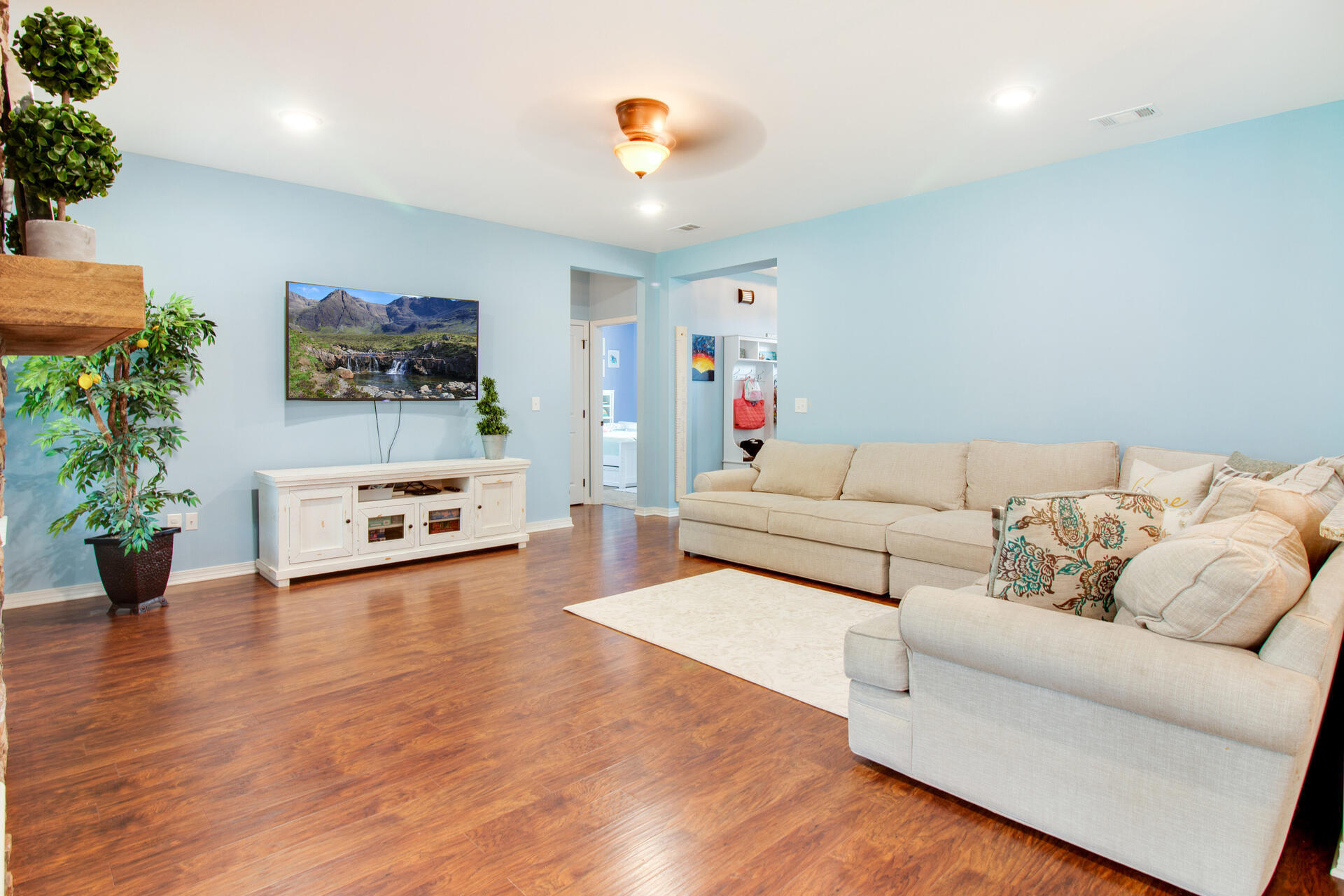 6212 Timberland Ridge Drive Crestview, FL 32539 - Photo 8 of 34 a living room with furniture and flowers