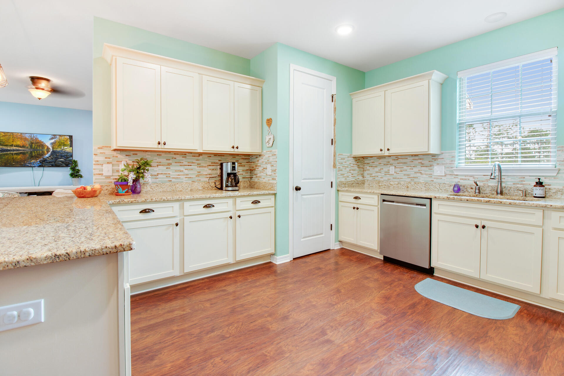 6212 Timberland Ridge Drive Crestview, FL 32539 - Photo 10 of 34 a kitchen with a sink cabinets and window