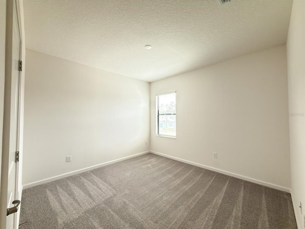 1282 Butterfly Orchid Road Davenport, FL 33837 - Photo 16 of 57